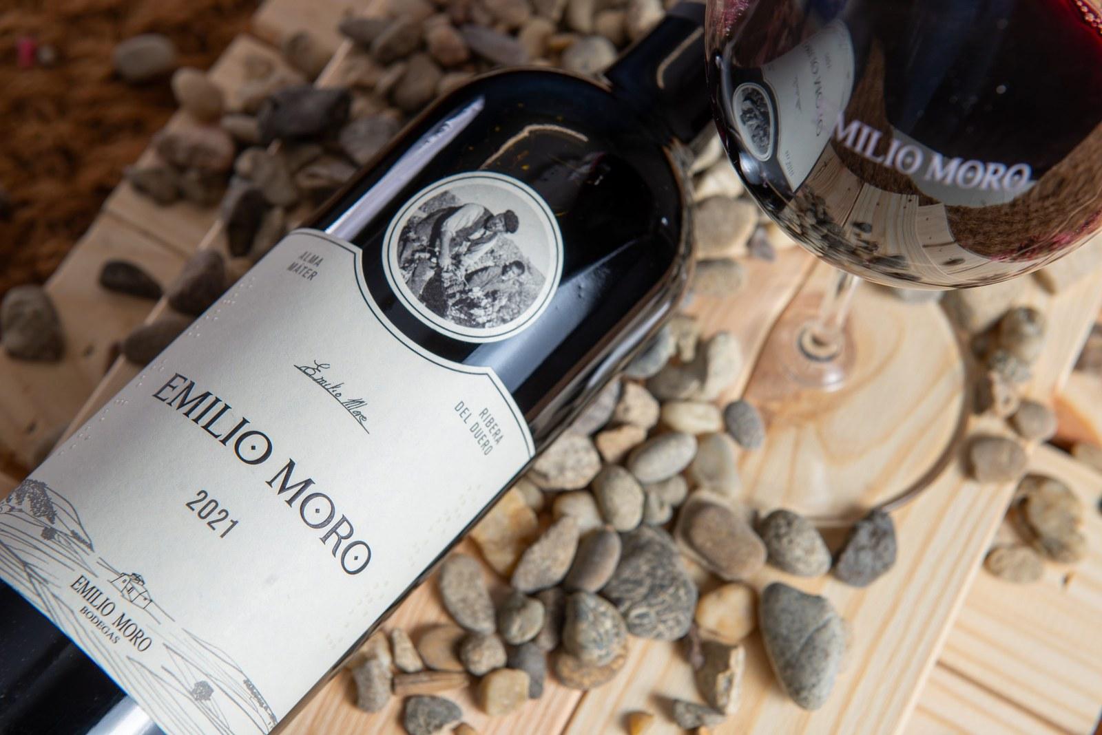 A bottle of Emilio Moro 2021 beside a glass of red